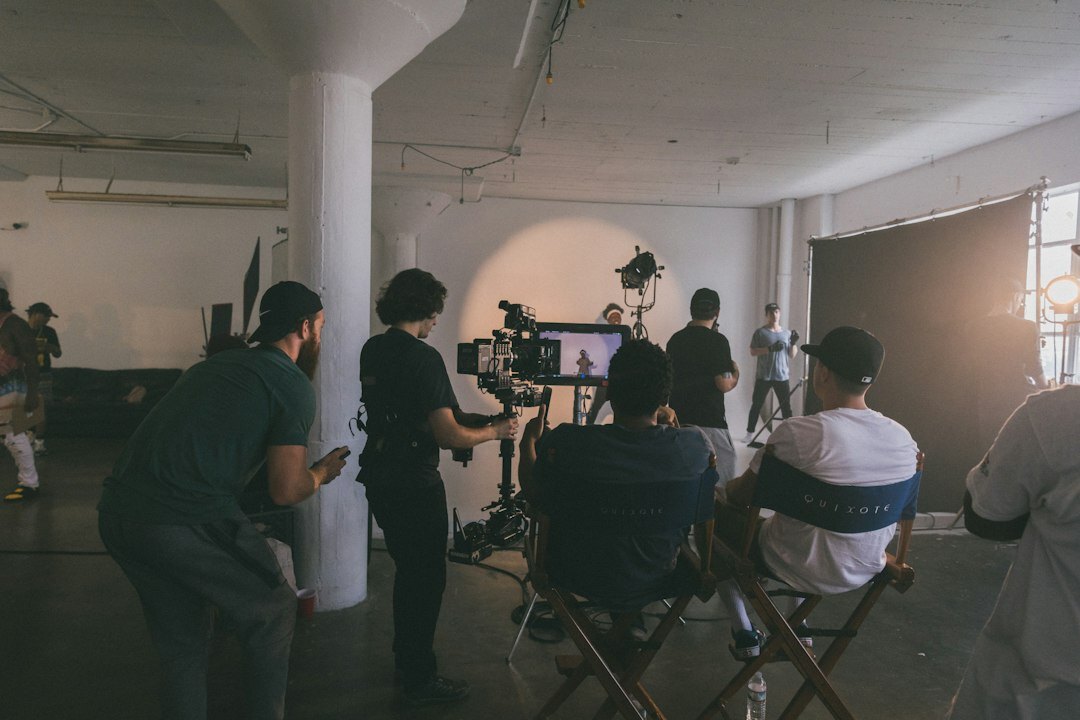 team reviewing video project