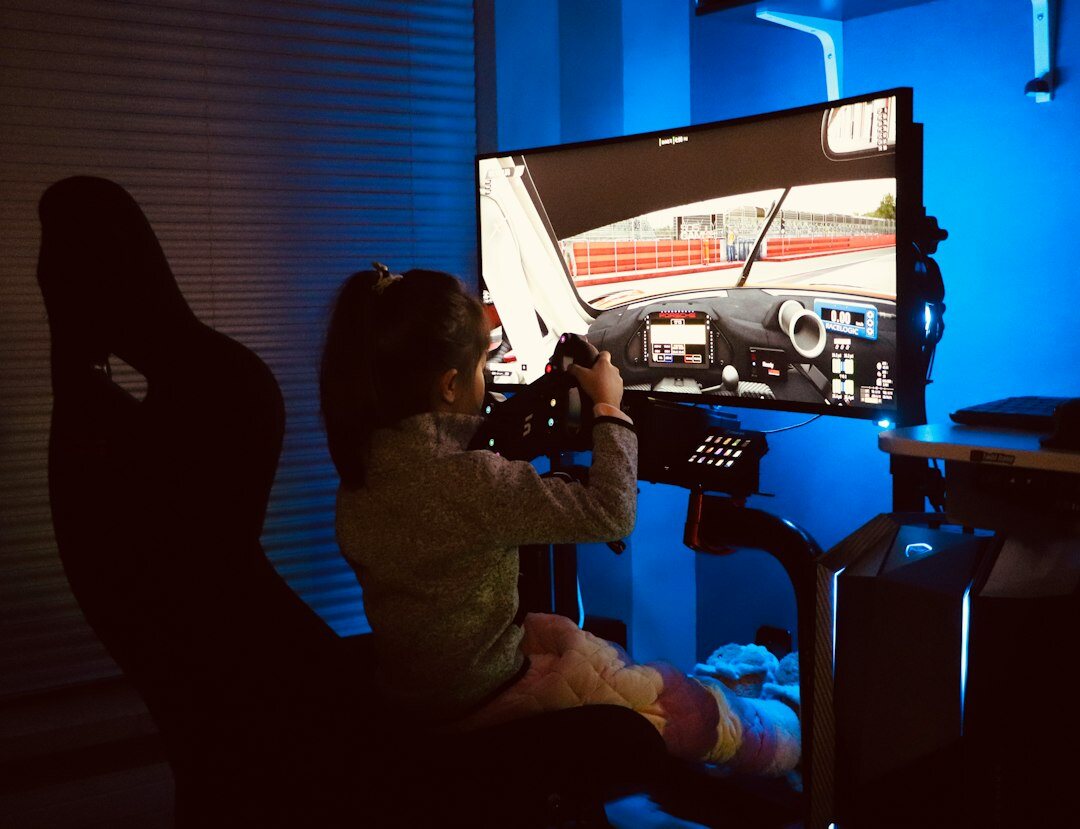 Editor working in a modern video editing suite with multiple monitors