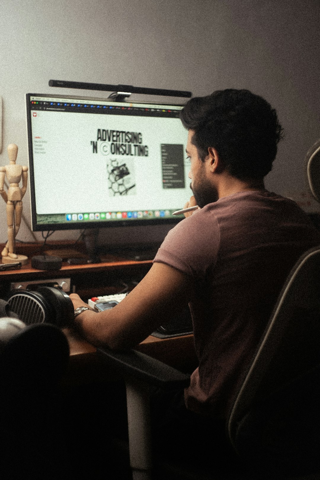 video editor working on computer