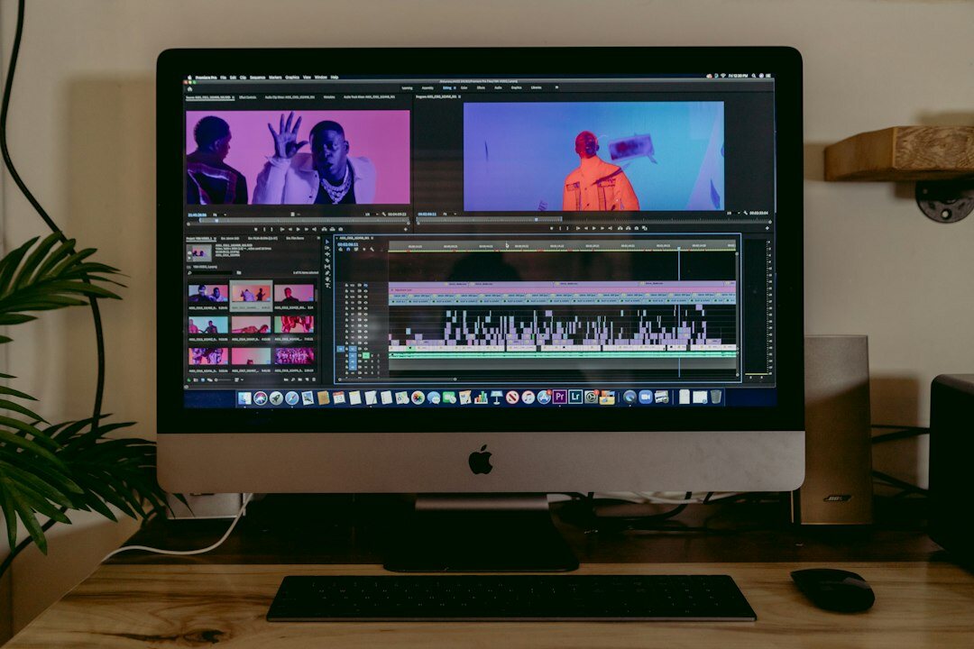 video editor working on computer